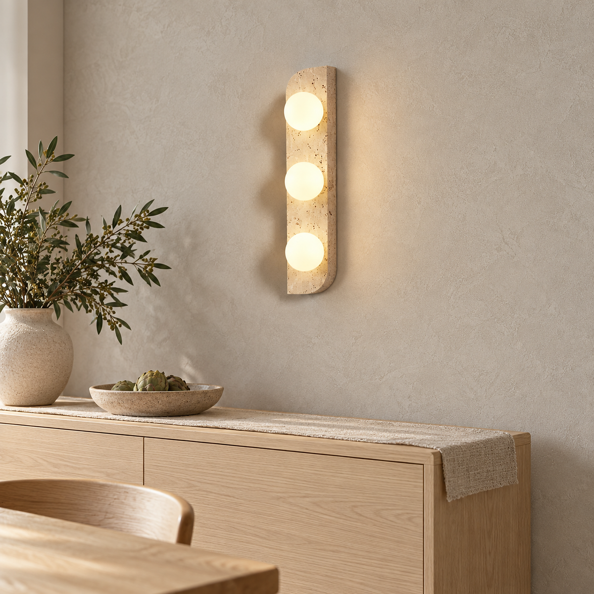Vemarilo yellow travertine and white plug in wall light showing a stone edge and warm glow
