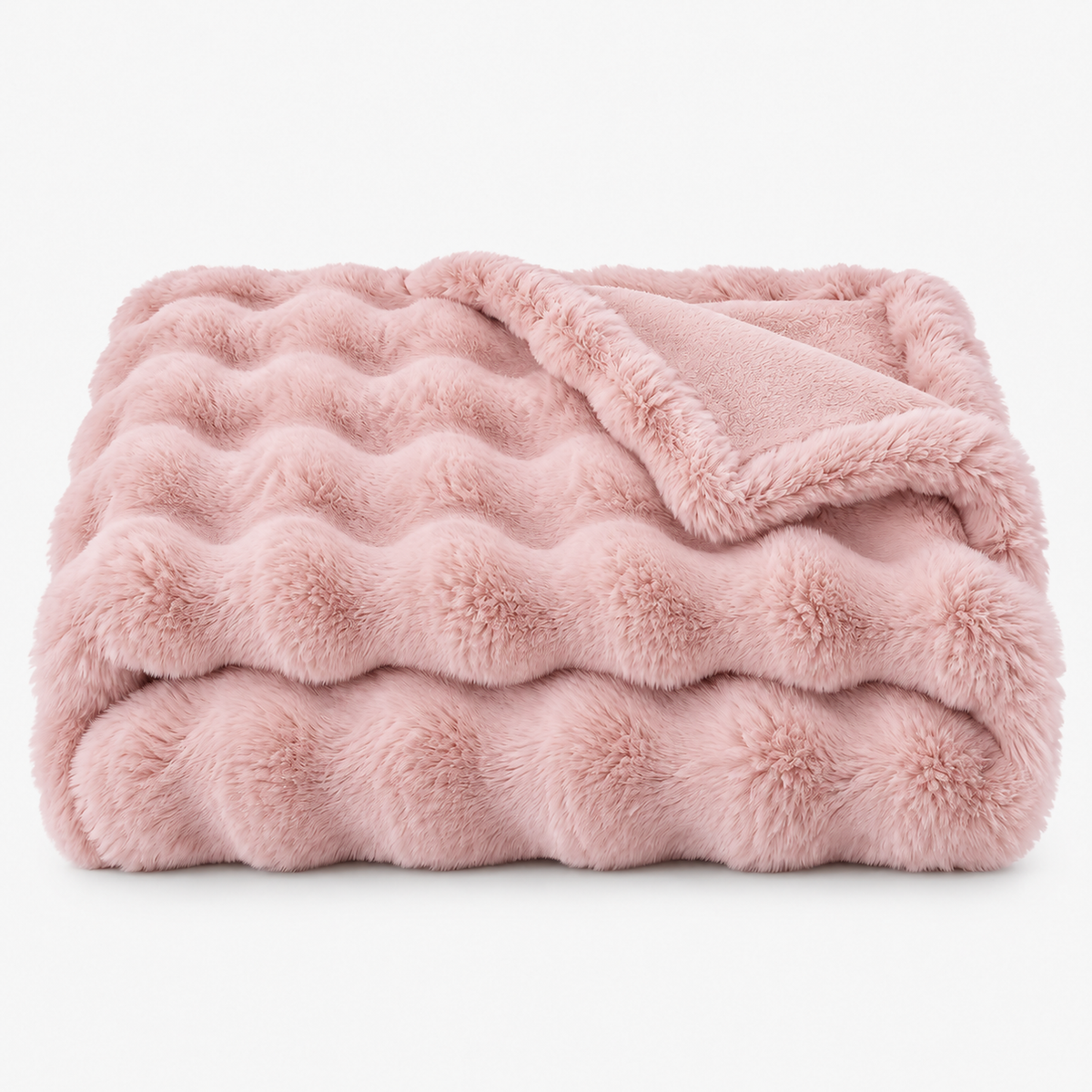 Vemarsi pink throw blanket in solid plain dyed faux fur loosely folded on a white backdrop #color_pink