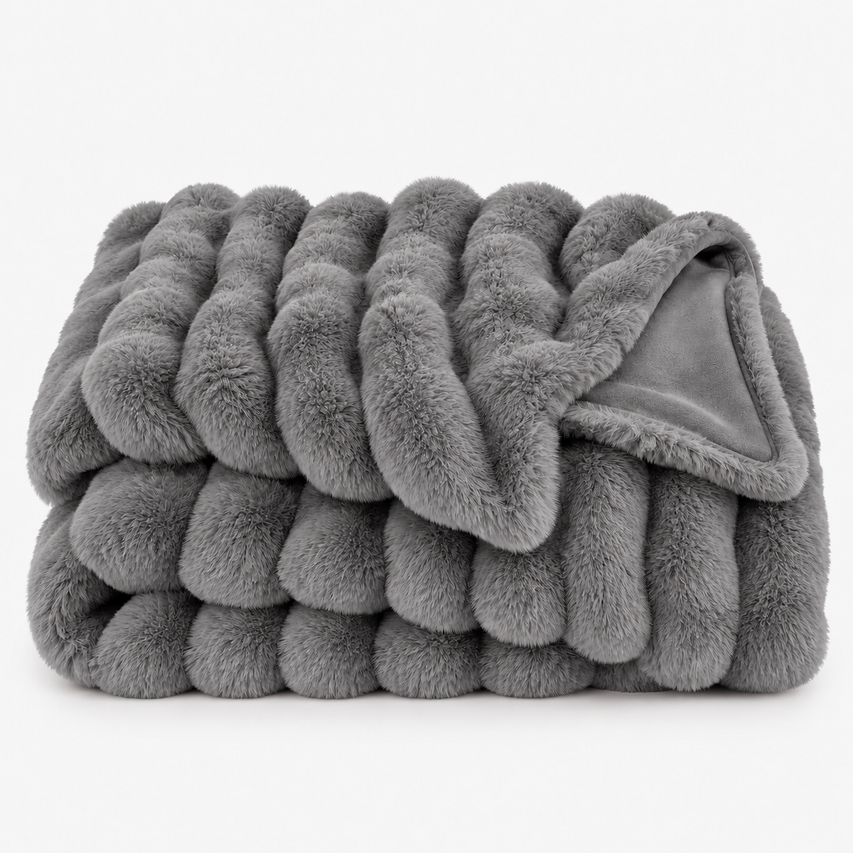 Vimarel gray faux fur throw blanket loosely folded with sculpted bubble fur #color_gray